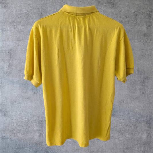 Polo vintage Lacoste amarillo estilo Y2K retro chic sporty elegante